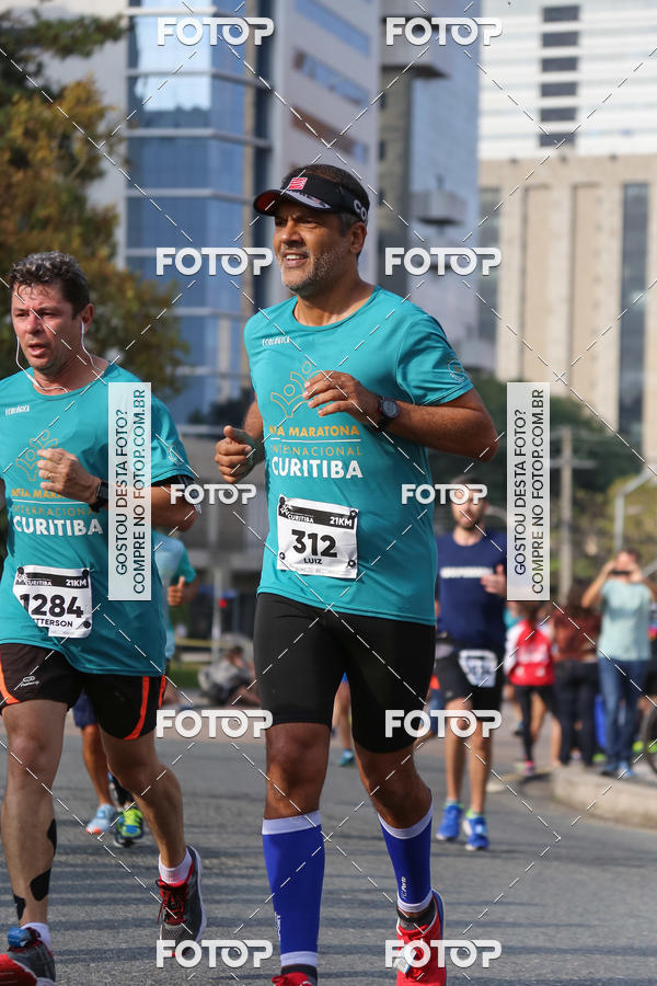 Buy your photos of the eventMeia Maratona Internacional de Curitiba 2018 on Fotop