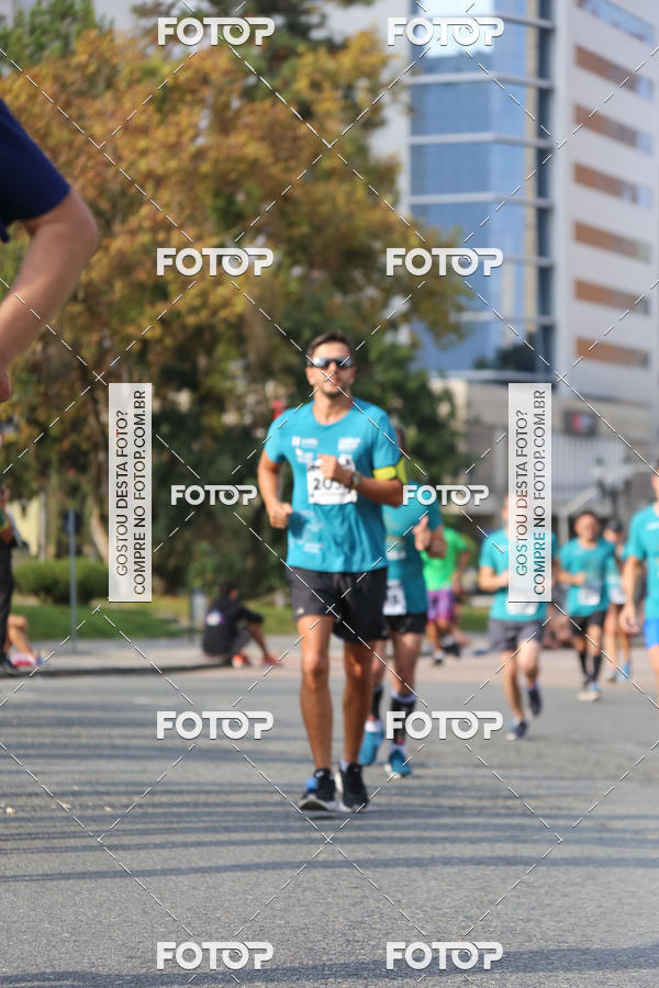 Buy your photos of the eventMeia Maratona Internacional de Curitiba 2018 on Fotop