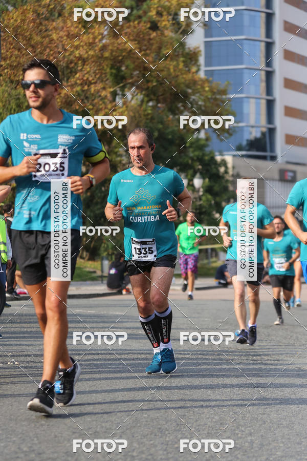 Buy your photos of the eventMeia Maratona Internacional de Curitiba 2018 on Fotop