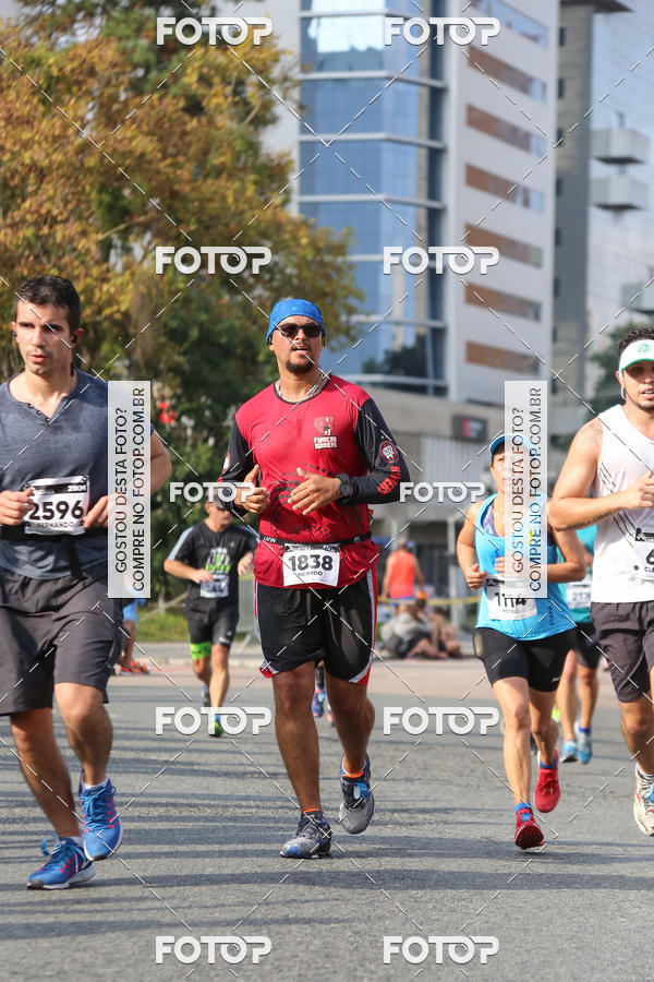 Buy your photos of the eventMeia Maratona Internacional de Curitiba 2018 on Fotop