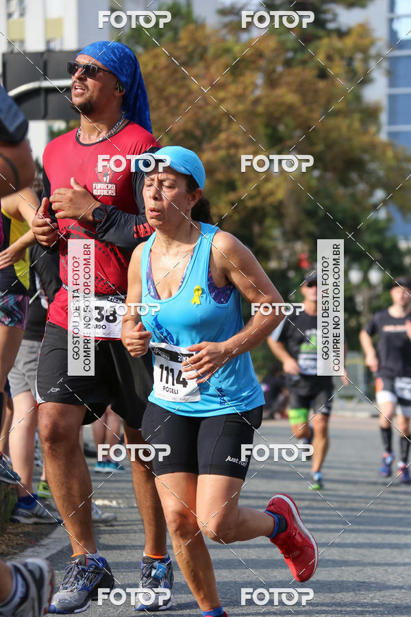 Buy your photos of the eventMeia Maratona Internacional de Curitiba 2018 on Fotop