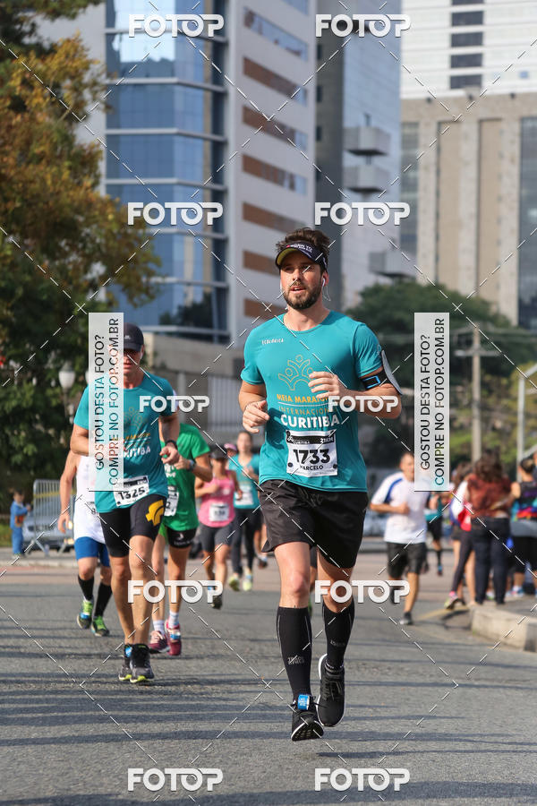 Buy your photos of the eventMeia Maratona Internacional de Curitiba 2018 on Fotop