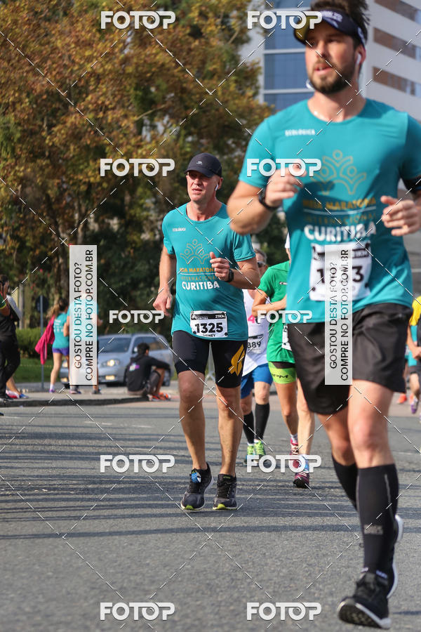 Buy your photos of the eventMeia Maratona Internacional de Curitiba 2018 on Fotop