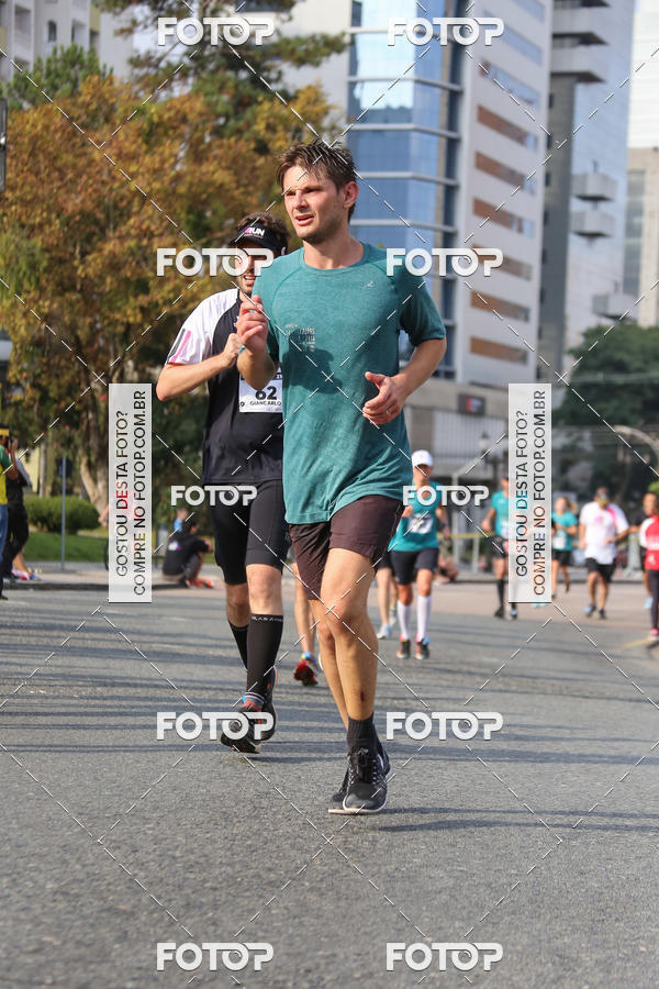 Buy your photos of the eventMeia Maratona Internacional de Curitiba 2018 on Fotop