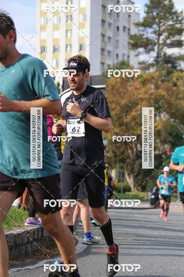 Buy your photos of the eventMeia Maratona Internacional de Curitiba 2018 on Fotop