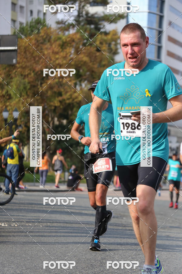 Buy your photos of the eventMeia Maratona Internacional de Curitiba 2018 on Fotop