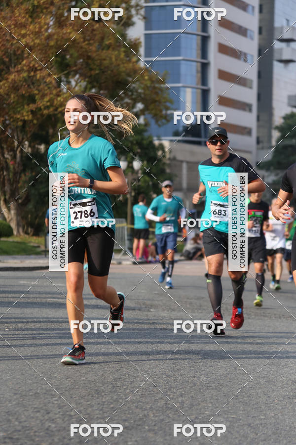 Buy your photos of the eventMeia Maratona Internacional de Curitiba 2018 on Fotop