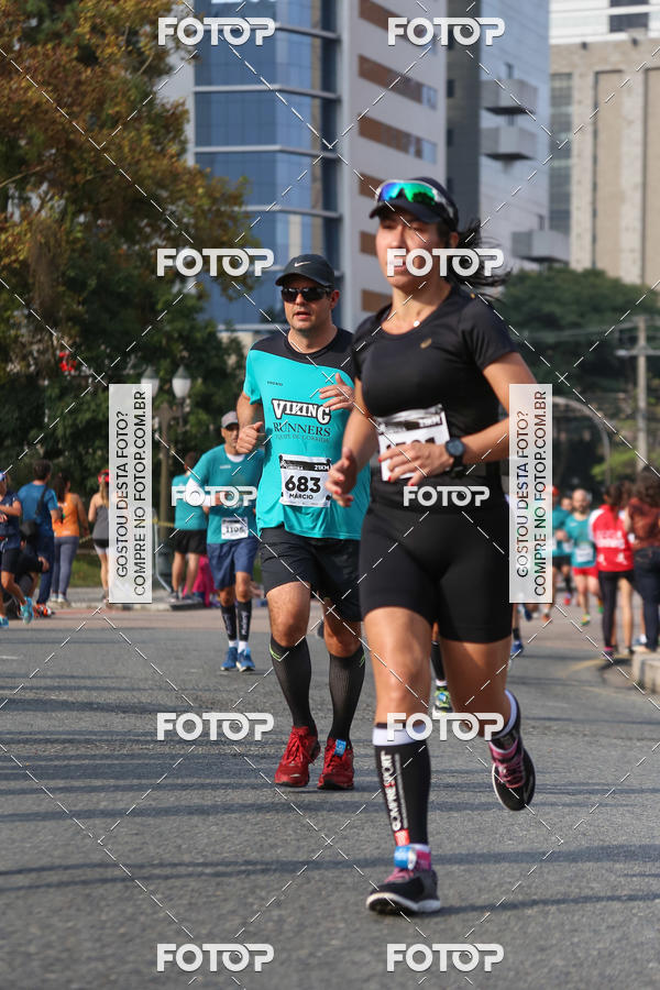 Buy your photos of the eventMeia Maratona Internacional de Curitiba 2018 on Fotop