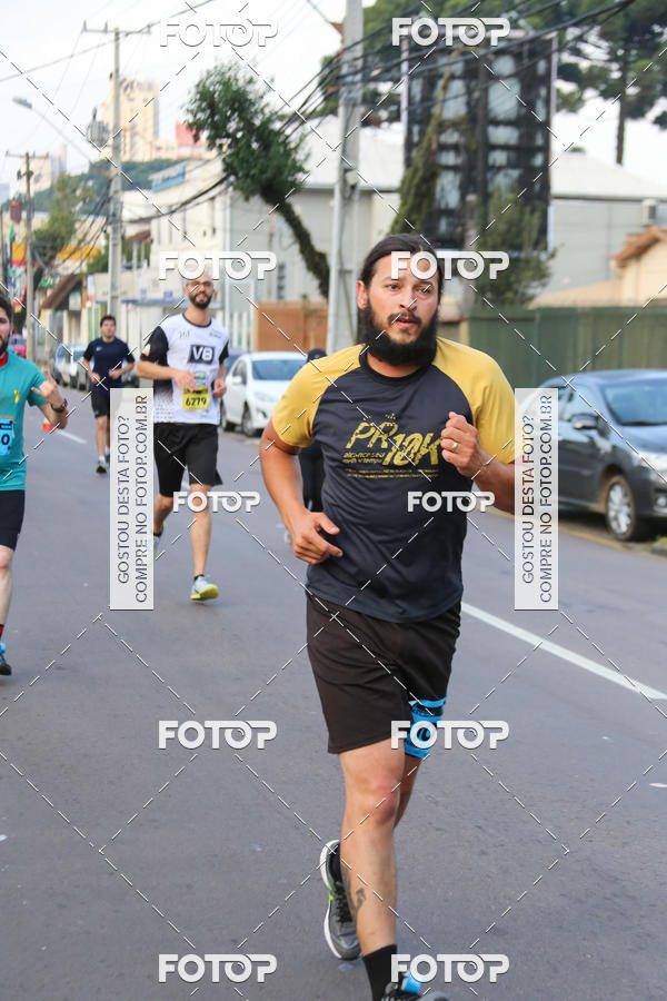 Buy your photos of the eventMeia Maratona Internacional de Curitiba 2018 on Fotop