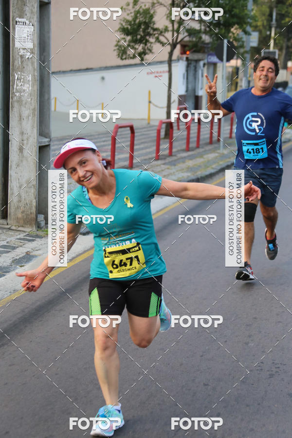 Buy your photos of the eventMeia Maratona Internacional de Curitiba 2018 on Fotop