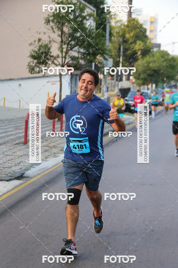 Buy your photos of the eventMeia Maratona Internacional de Curitiba 2018 on Fotop