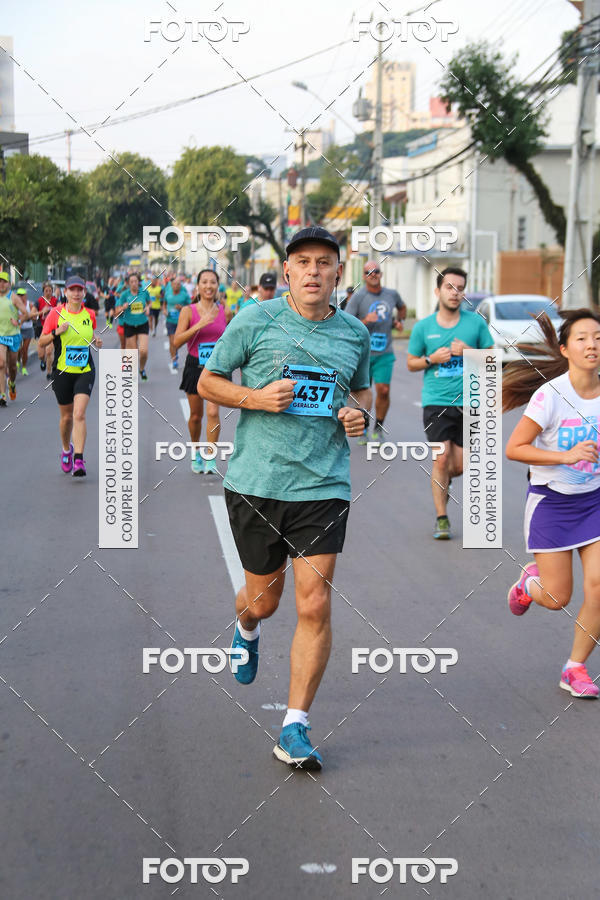 Buy your photos of the eventMeia Maratona Internacional de Curitiba 2018 on Fotop