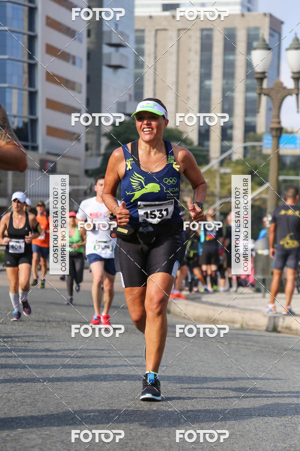 Buy your photos of the eventMeia Maratona Internacional de Curitiba 2018 on Fotop