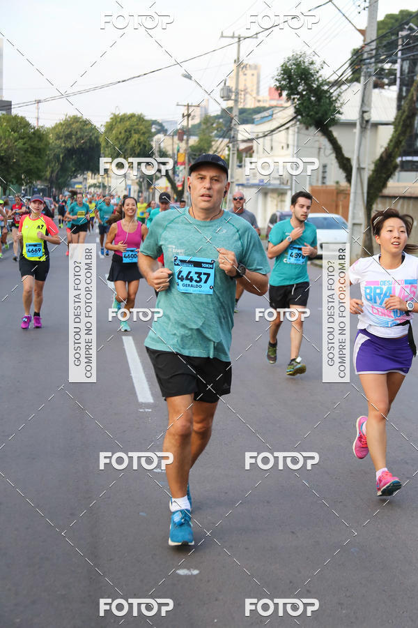 Buy your photos of the eventMeia Maratona Internacional de Curitiba 2018 on Fotop