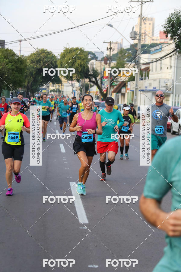 Buy your photos of the eventMeia Maratona Internacional de Curitiba 2018 on Fotop