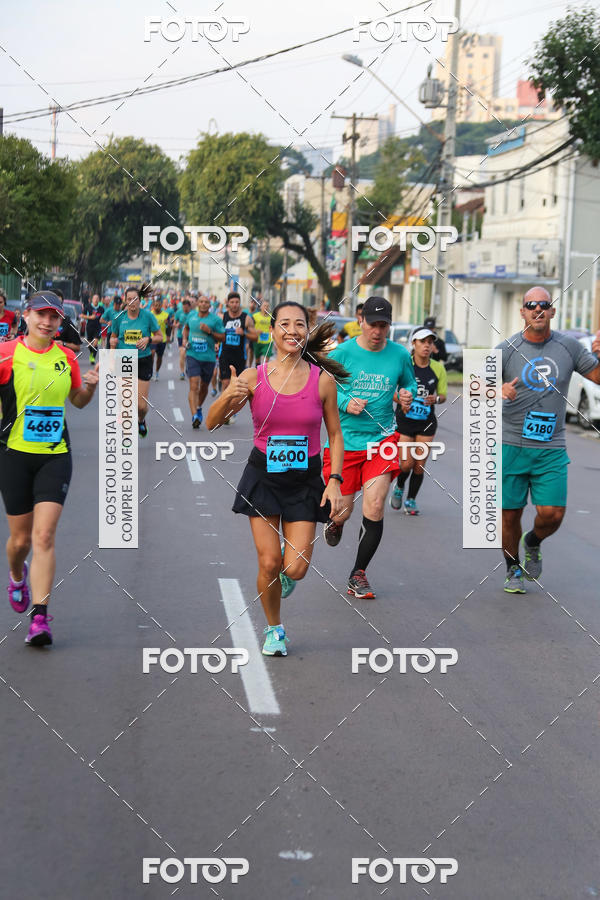 Buy your photos of the eventMeia Maratona Internacional de Curitiba 2018 on Fotop