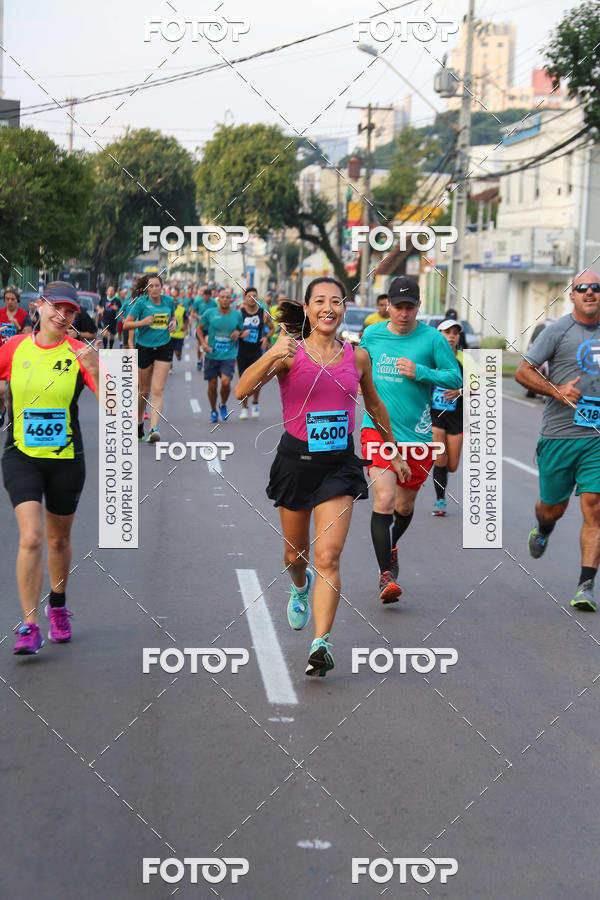 Buy your photos of the eventMeia Maratona Internacional de Curitiba 2018 on Fotop
