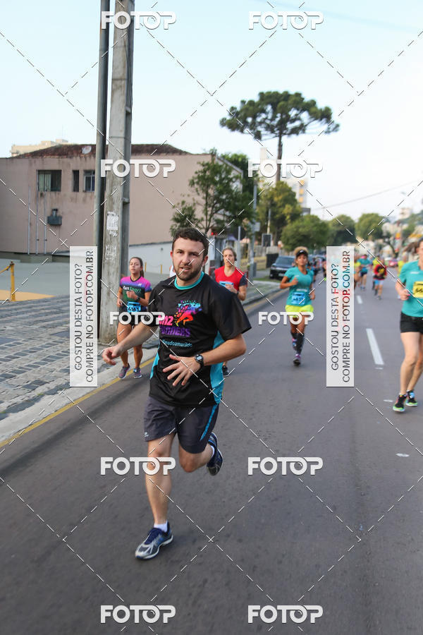 Buy your photos of the eventMeia Maratona Internacional de Curitiba 2018 on Fotop