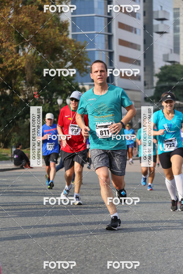 Buy your photos of the eventMeia Maratona Internacional de Curitiba 2018 on Fotop