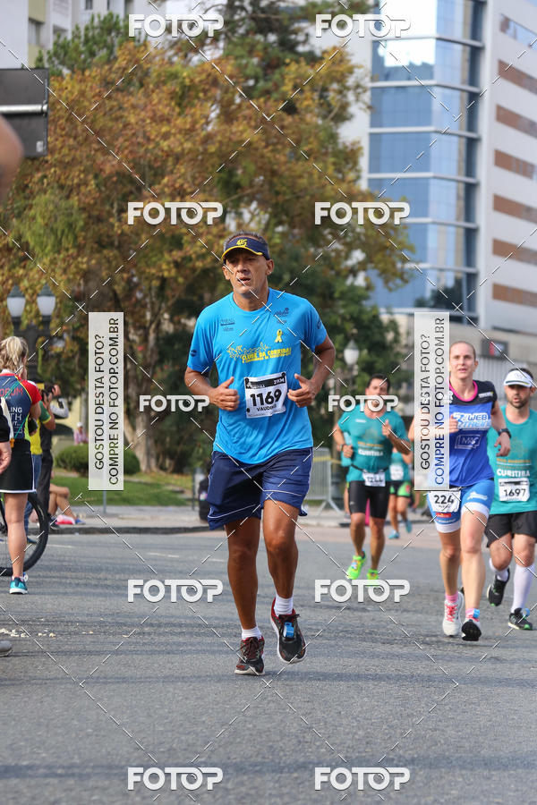 Buy your photos of the eventMeia Maratona Internacional de Curitiba 2018 on Fotop