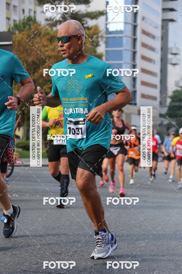Buy your photos of the eventMeia Maratona Internacional de Curitiba 2018 on Fotop