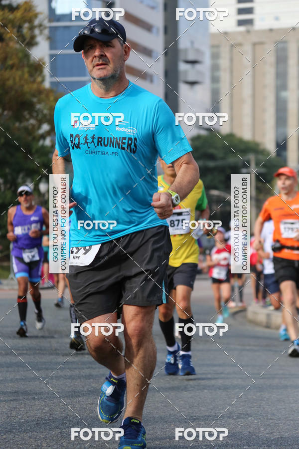 Buy your photos of the eventMeia Maratona Internacional de Curitiba 2018 on Fotop