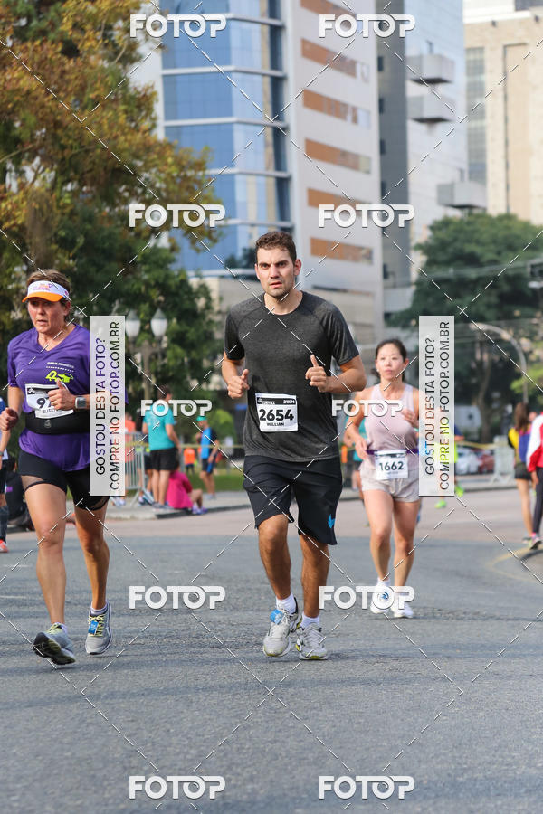 Buy your photos of the eventMeia Maratona Internacional de Curitiba 2018 on Fotop