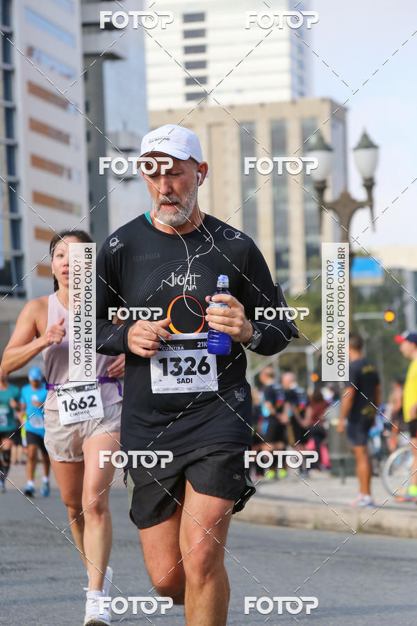 Buy your photos of the eventMeia Maratona Internacional de Curitiba 2018 on Fotop