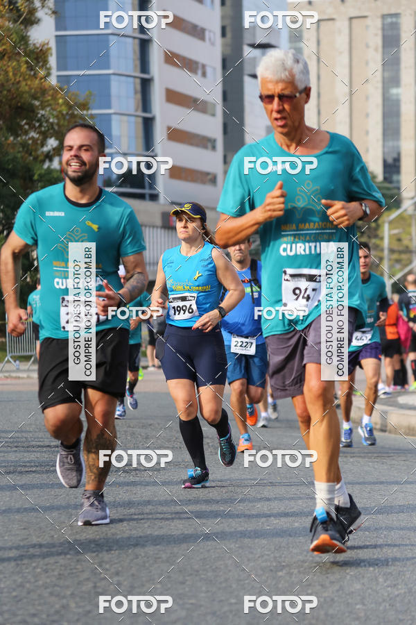 Buy your photos of the eventMeia Maratona Internacional de Curitiba 2018 on Fotop