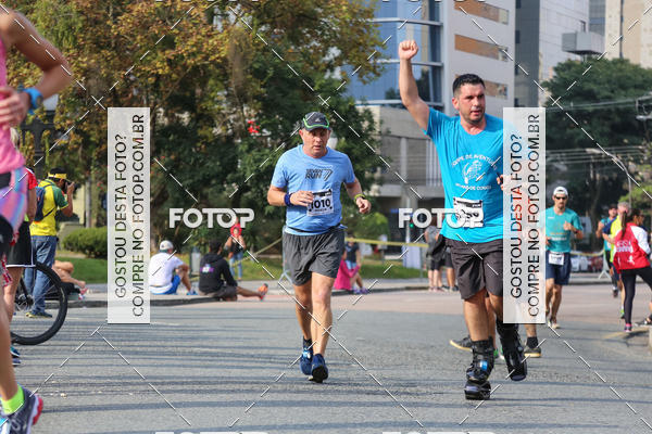 Buy your photos of the eventMeia Maratona Internacional de Curitiba 2018 on Fotop