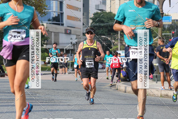 Buy your photos of the eventMeia Maratona Internacional de Curitiba 2018 on Fotop