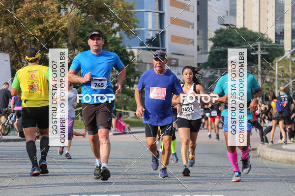 Buy your photos of the eventMeia Maratona Internacional de Curitiba 2018 on Fotop