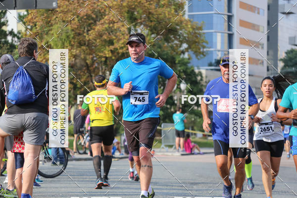 Buy your photos of the eventMeia Maratona Internacional de Curitiba 2018 on Fotop