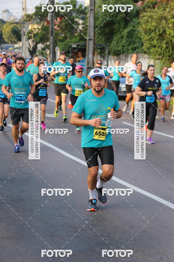 Buy your photos of the eventMeia Maratona Internacional de Curitiba 2018 on Fotop