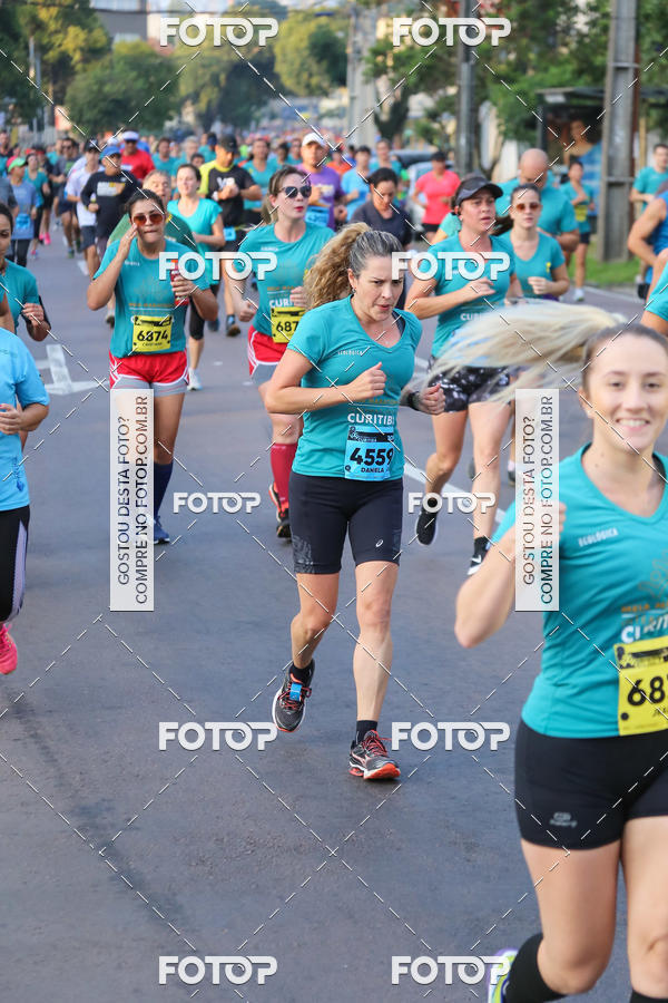 Buy your photos of the eventMeia Maratona Internacional de Curitiba 2018 on Fotop