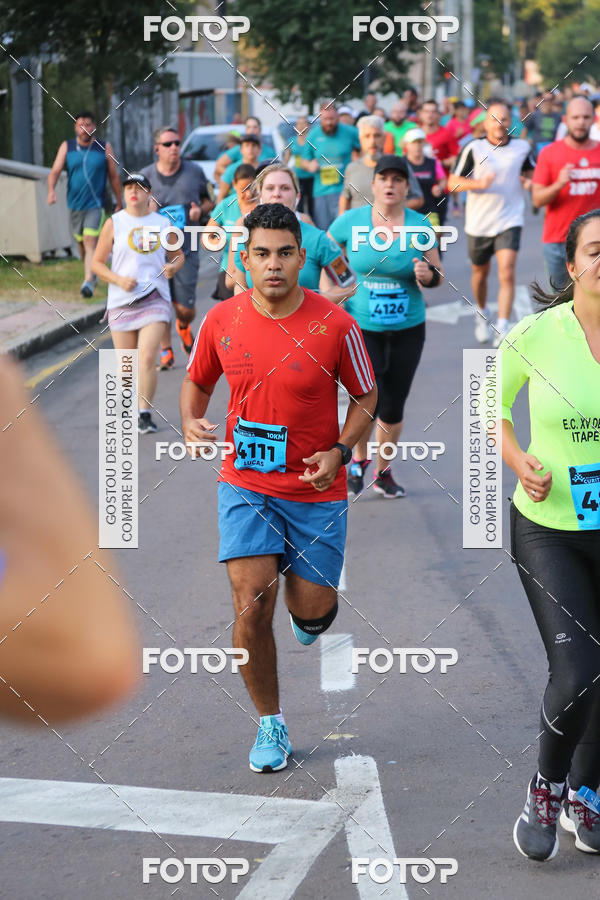 Buy your photos of the eventMeia Maratona Internacional de Curitiba 2018 on Fotop