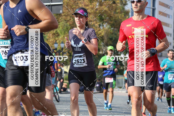 Buy your photos of the eventMeia Maratona Internacional de Curitiba 2018 on Fotop