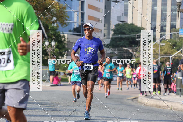 Buy your photos of the eventMeia Maratona Internacional de Curitiba 2018 on Fotop