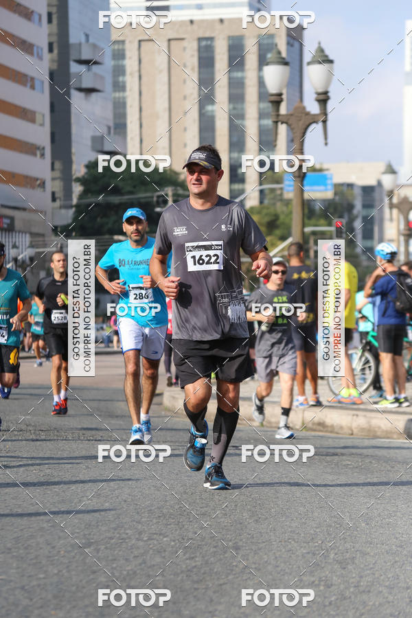 Buy your photos of the eventMeia Maratona Internacional de Curitiba 2018 on Fotop