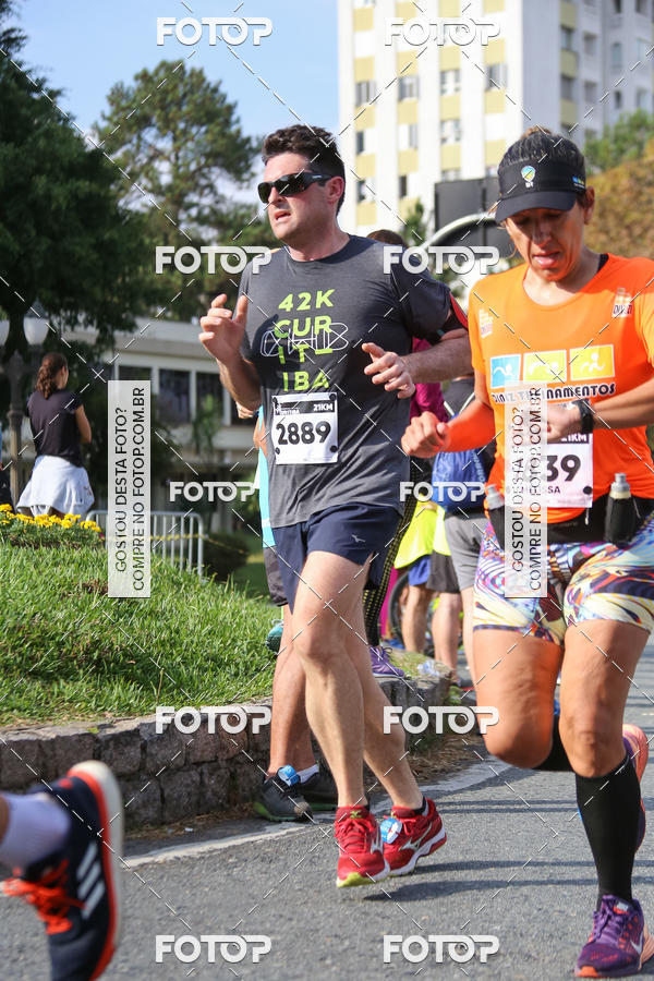 Buy your photos of the eventMeia Maratona Internacional de Curitiba 2018 on Fotop