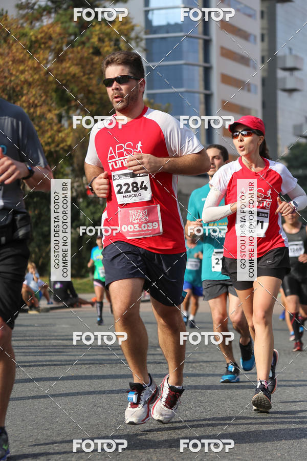 Buy your photos of the eventMeia Maratona Internacional de Curitiba 2018 on Fotop