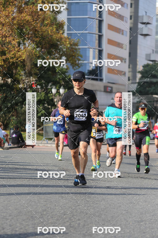 Buy your photos of the eventMeia Maratona Internacional de Curitiba 2018 on Fotop