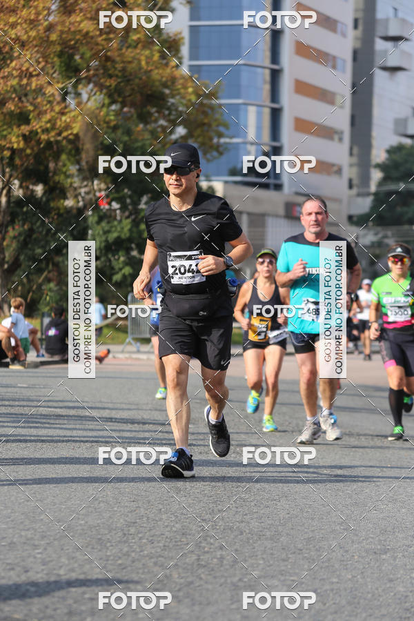 Buy your photos of the eventMeia Maratona Internacional de Curitiba 2018 on Fotop