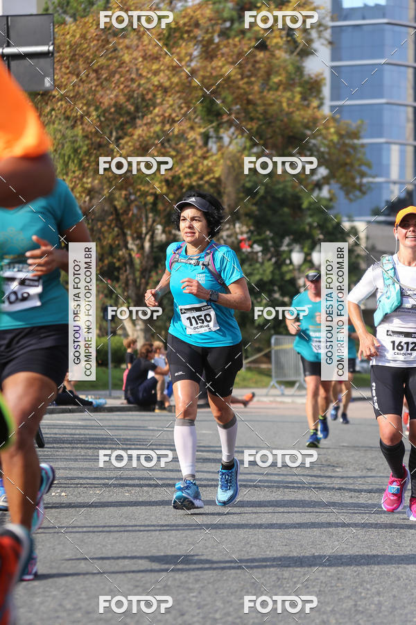 Buy your photos of the eventMeia Maratona Internacional de Curitiba 2018 on Fotop