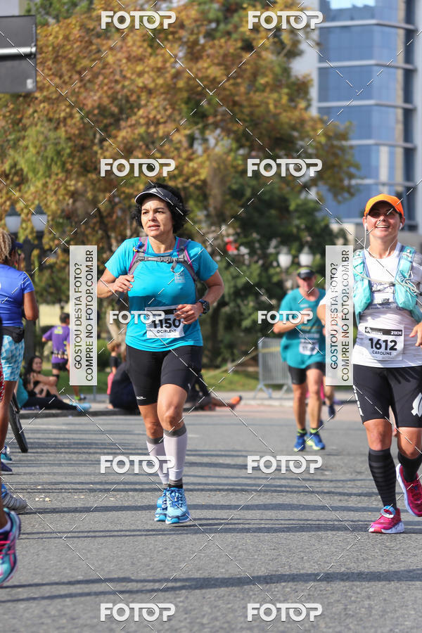Buy your photos of the eventMeia Maratona Internacional de Curitiba 2018 on Fotop