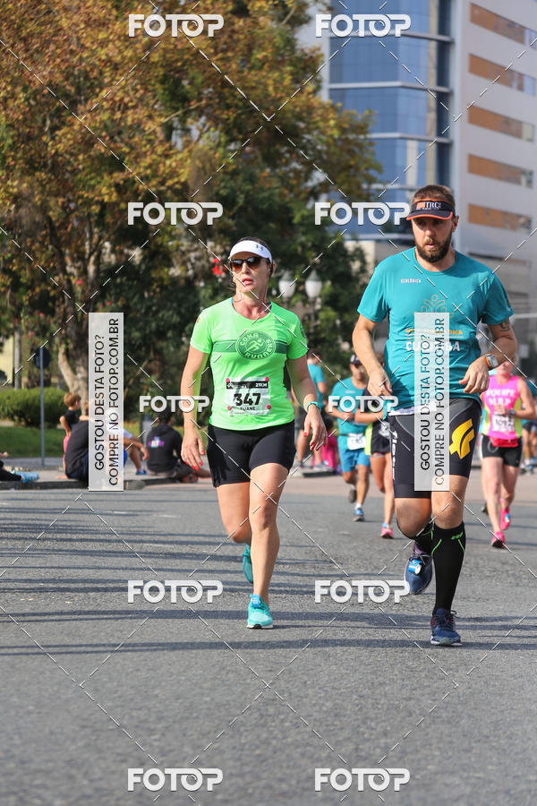 Buy your photos of the eventMeia Maratona Internacional de Curitiba 2018 on Fotop