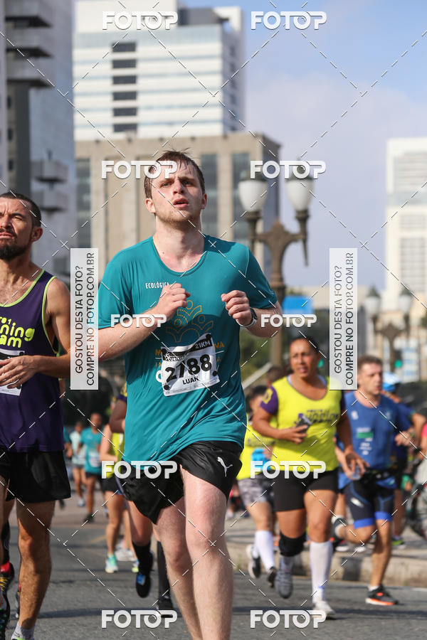 Buy your photos of the eventMeia Maratona Internacional de Curitiba 2018 on Fotop