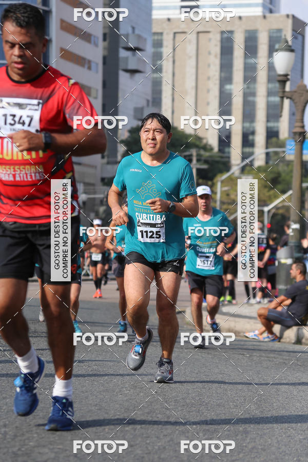 Buy your photos of the eventMeia Maratona Internacional de Curitiba 2018 on Fotop