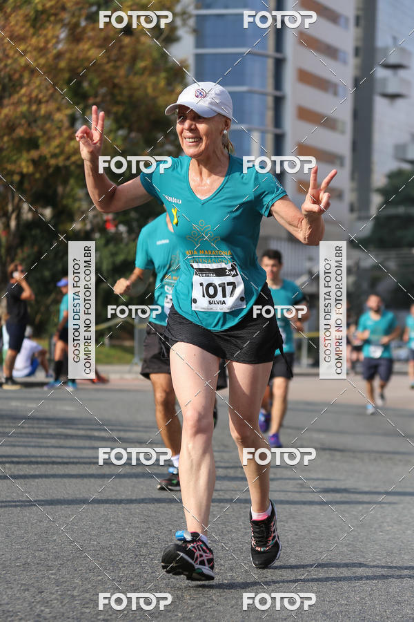 Buy your photos of the eventMeia Maratona Internacional de Curitiba 2018 on Fotop