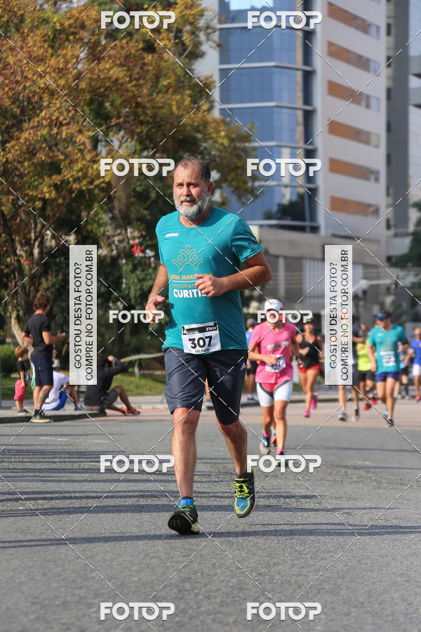Buy your photos of the eventMeia Maratona Internacional de Curitiba 2018 on Fotop